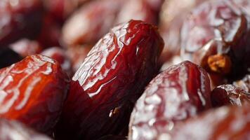 A CloseUp View of Juicy and Delicious Dried Dates Beautifully Arranged on Display video