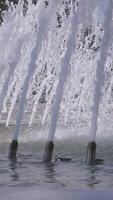 An Elegant Water Fountain featuring Cascading Jets gracefully flowing into a serene Tranquil Pool video
