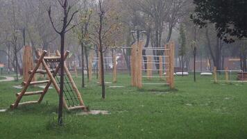 A Quiet Playground Set in a Misty Park, Ideal for Calm and Active Community Enjoyment video