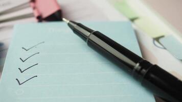 check mark on a check box on a paper video