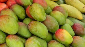 You can find Fresh Mangoes and Bananas available at the local Market for purchase video