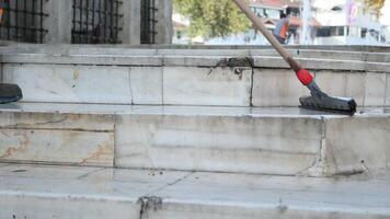 A Comprehensive Guide to Effectively Cleaning a Public Space with a Roller Brush Tool video