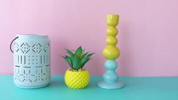 A Collection of Colorful Decorative Items Positioned on a Soft Pastel Background video