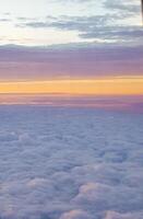 A view of the clouds from an airplane window photo