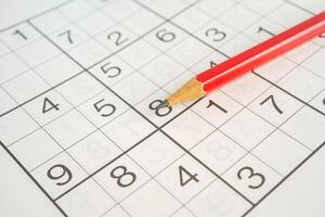 Sudoku puzzle, brain game for developing Alzheimer disease in senior patient. photo