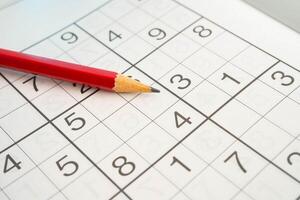 Sudoku puzzle, brain game for developing Alzheimer disease in senior patient. photo