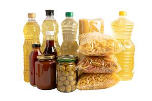 Foodstuffs in donation box isolated on white background with clipping path for volunteer to help people. photo