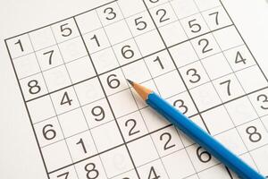 Sudoku puzzle, brain game for developing Alzheimer disease in senior patient. photo