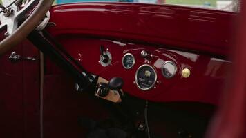 Dashboard close up view inside retro vehicle polished to shine. video