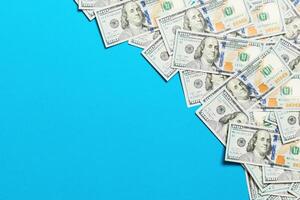 dollar bills a on a light colored background. copy space, top view business concept photo