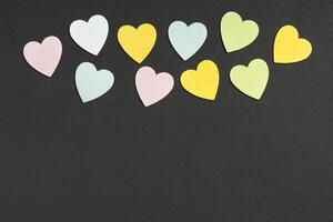 Top view of wooden hearts on colorful background with copy space. Romantic concept. St Valentine's Day photo