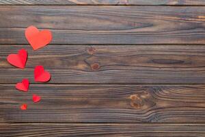 Valentine day background with red hearts, top view with copy space photo