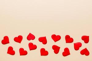 Valentine day background with red hearts, top view with copy space photo