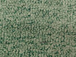 Close-up of Green Carpet Texture, Perfect for Background or Design Projects photo