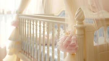 White crib with pink canopy and frills in a bright room. photo