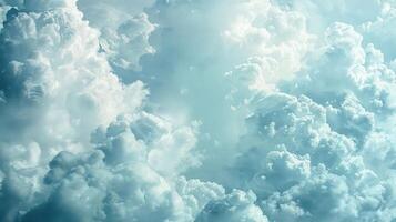 A wide shot of a bright blue sky with fluffy white clouds. The clouds are arranged in a way that creates a sense of depth and dimension. photo