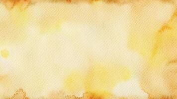 Abstract yellow watercolor background creating splatters and washes photo