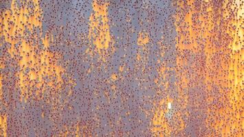 This high-resolution abstract texture showcases the beauty of natural rusted metal surfaces. Perfect for industrial-themed designs, grunge art, or as a unique background for creative projects. photo