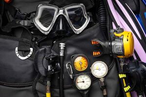 Scuba Gear for a Dive on a Boat, Scuba equipment Scuba Fins, Regulator Octopus, Depth Gauge , Balanced Regulator ,Power Inflator ,Dive Mask and Snorkel , Scuba Gear for a Dive on a Boat photo