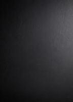 Black wall background with gradient texture, A dark, textured background, possibly a wall or floor photo