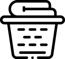 A black and white icon of a basket with a towel vector