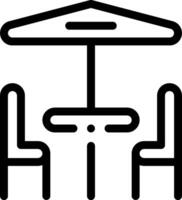 A black and white image of a table and chairs vector