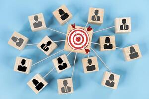 Target connection linkage with human icon for customer focus target group and customer relation management concept. photo