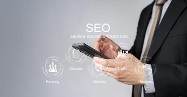 SEO, Search Engine Optimization ranking concept, magnifying glass, the idea of promote traffic to website photo