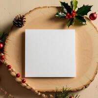 Crisp White Card Mockup with Warm Wooden Board and Festive Red, Green, Gold Christmas Decoration photo