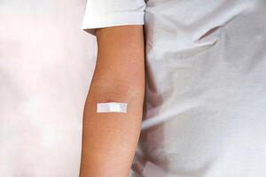 concept of blood donor, showing injection marks photo