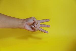 Open palm Count three with finger photo
