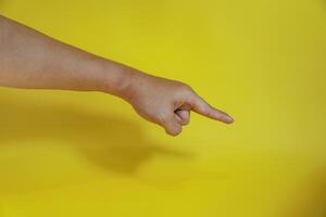 hand pointing on virtual object with index finger, making gesture photo