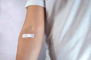 closeup showing arm after injection photo