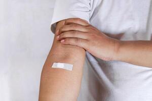 closeup showing arm after injection photo