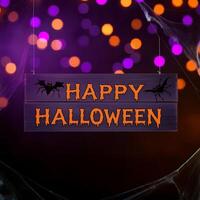 A haunted backdrop showcasing Happy Halloween. photo