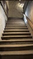 Medieval wooden staircase with steps in the castle, view from the inside. Poland photo