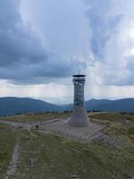 Observation tower on the peak of Mount Kralicky Sneznik, Eastern Sudetes on the border of Poland and the Czech Republic photo