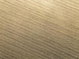 Plowed agricultural field, view from above, background. photo