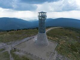 Observation tower on the peak of Mount Kralicky Sneznik, Eastern Sudetes on the border of Poland and the Czech Republic photo