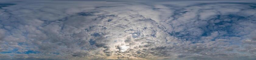 Sky panorama with Stratocumulus clouds in Seamless spherical equirectangular format. Full zenith for use in 3D graphics, game and editing aerial drone 360 degree panoramas for sky replacement. photo