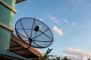Black satellite dishes of broadcasting receiver photo