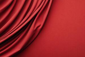 Red fabric with draping folds photo