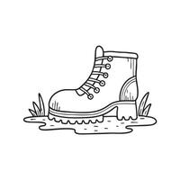 An illustration of a boot resting on a muddy trail vector