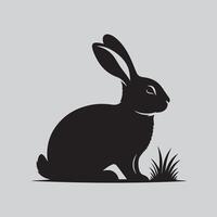 A Bunny silhouette design with grass vector