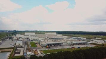 view of the building of the plant for the production of flooring boards. Woodworking factory. Aerial view video
