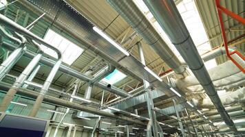 View of the ventilation system of the parquet factory. Camera motion to forward video