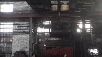 Factory overhead crane inside factory building. Factory room structure made from iron and steel. Old industrial grunge wall with metal structures video