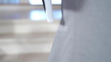 colleague with folders in her hands is running to the office on the stairs. Late for work video