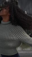 A Person Enjoys a Beautiful Candid Moment While Dressed in a Cozy and Comfortable Sweater video