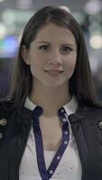 A confident professional at a modern event, networking and engaging with others video